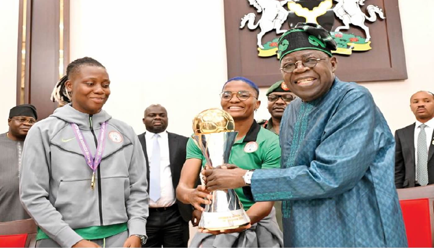 TINUBU-RECEIVES-TROPHY